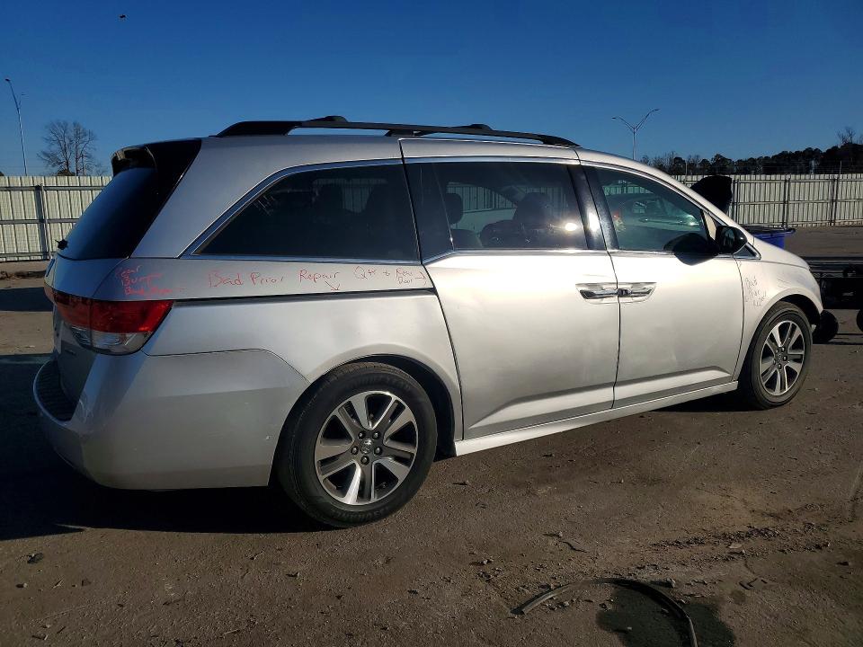 Photo 3 from auction – 2014 HONDA ODYSSEY with VIN 5FNRL5H94EB094357
