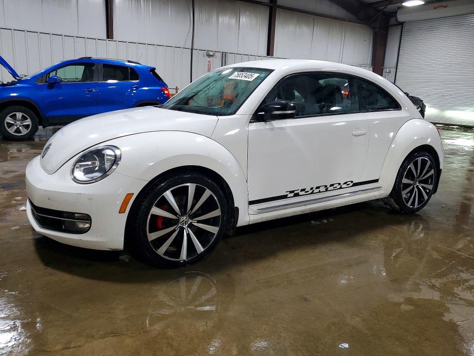 Фото 1 с аукциона – 2012 VOLKSWAGEN BEETLE TUR с VIN 3VWVA7AT9CM604116