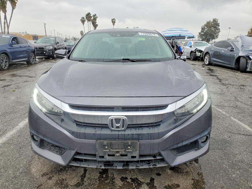 Photo 5 from auction – 2017 HONDA CIVIC with VIN 19XFC1F96HE207721