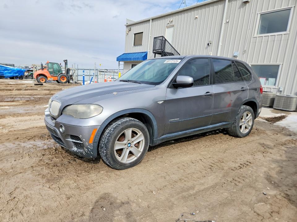 BMW X5 2011 with VIN 5UXZW0C54BL657610 - Photo from auction