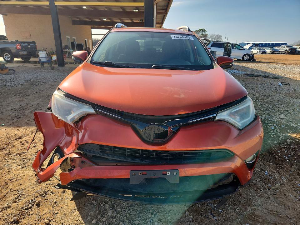 Photo 5 from auction – 2016 TOYOTA RAV4 with VIN JTMWFREV5GJ062192