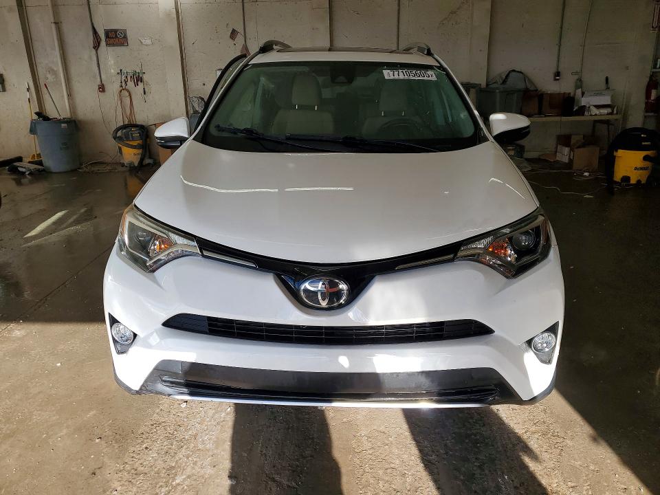 Photo 5 from auction – 2017 TOYOTA RAV4 XLE with VIN JTMWFREV6HJ714447