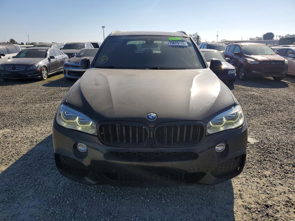 Photo 5 from auction – 2014 BMW X5 XDRIVE5 with VIN 5UXKR6C57E0J72587