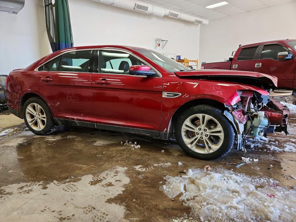 Photo 4 from auction – 2014 FORD TAURUS SEL with VIN 1FAHP2E82EG117298