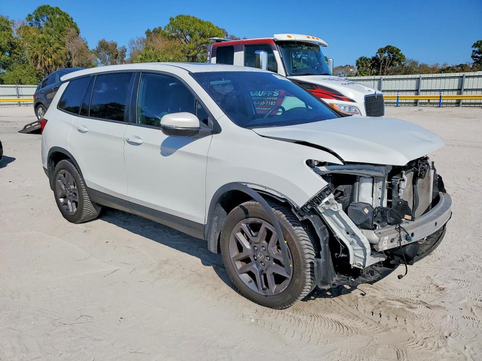Photo 4 from auction – 2022 HONDA PASSPORT E with VIN 5FNYF8H54NB020633