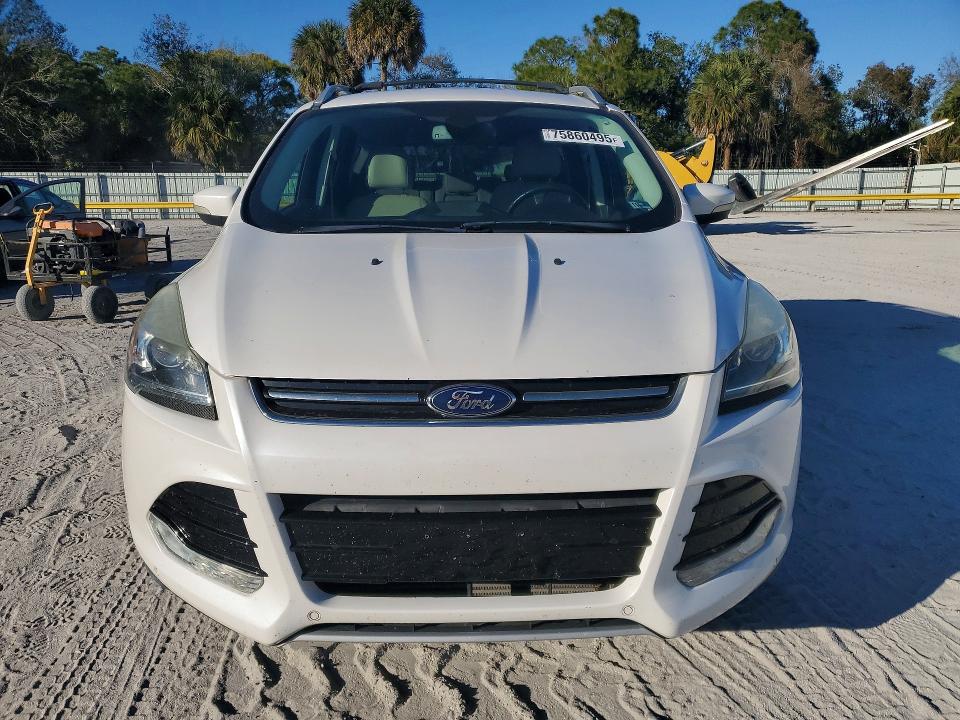 Photo 5 from auction – 2016 FORD ESCAPE TIT with VIN 1FMCU9J95GUA73219