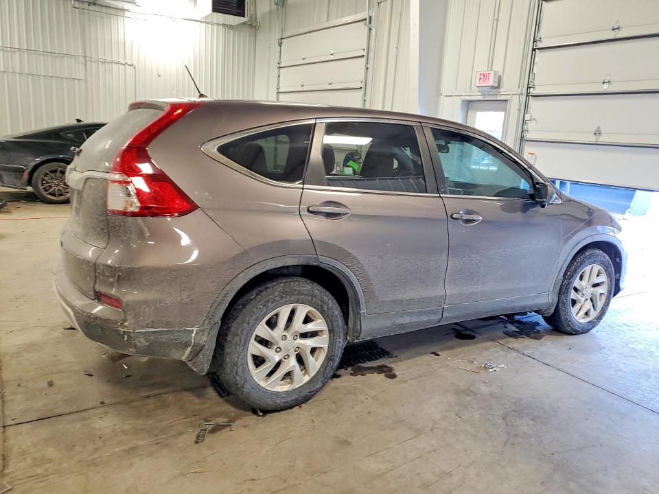 Photo 3 from auction – 2016 HONDA CR-V with VIN 2HKRM3H57GH565906