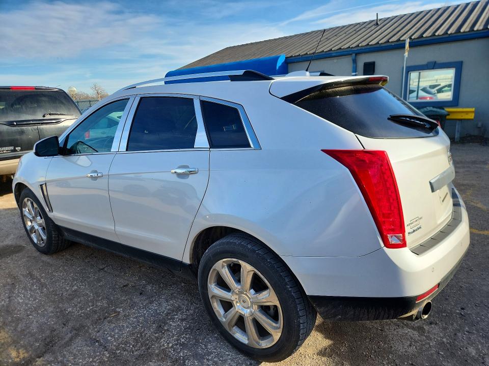 Photo 2 from auction – 2016 CADILLAC SRX LUXURY with VIN 3GYFNBE37GS584582