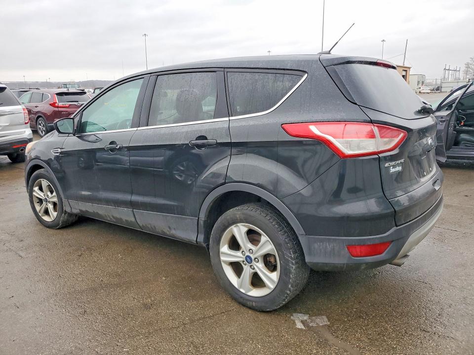 Photo 2 from auction – 2015 FORD ESCAPE with VIN 1FMCU0GX5FUB01682