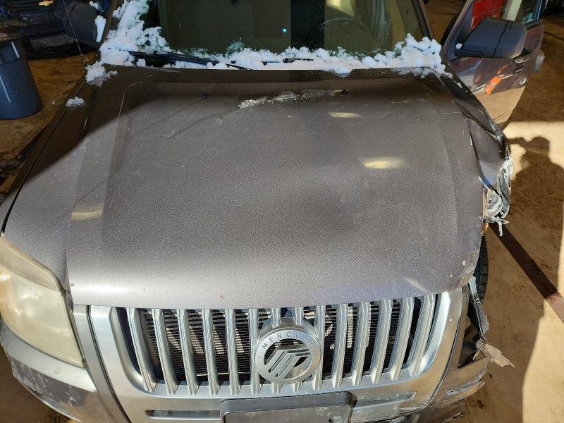 Photo 12 from auction – 2010 MERCURY MARINER with VIN 4M2CN8B70AKJ18945