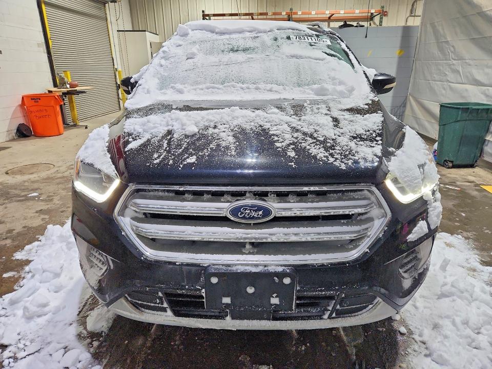 Photo 5 from auction – 2019 FORD ESCAPE with VIN 1FMCU9J95KUC17568