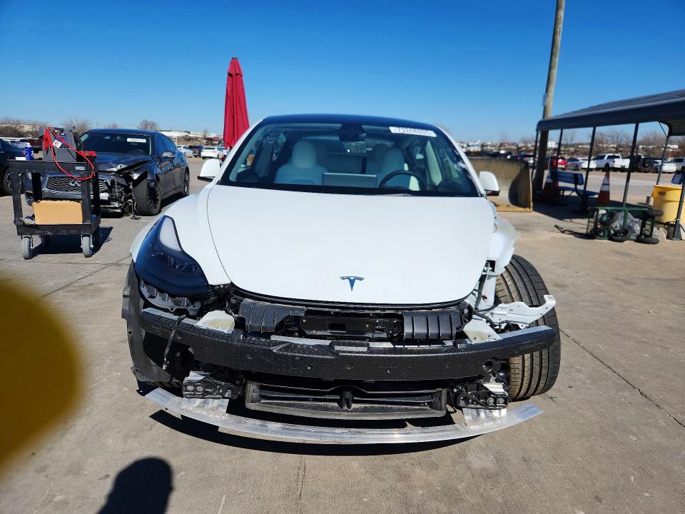 Photo 5 from auction – 2022 TESLA MODEL 3 with VIN 5YJ3E1EC5NF297234
