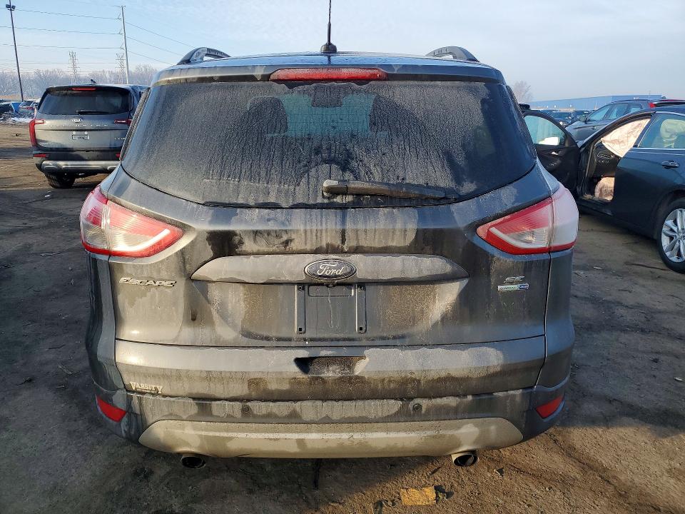 Photo 6 from auction – 2016 FORD ESCAPE with VIN 1FMCU9GX7GUA52135