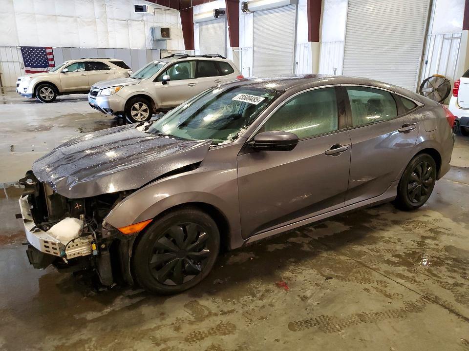 HONDA CIVIC 2018 with VIN 19XFC2F54JE017344 - Photo from auction