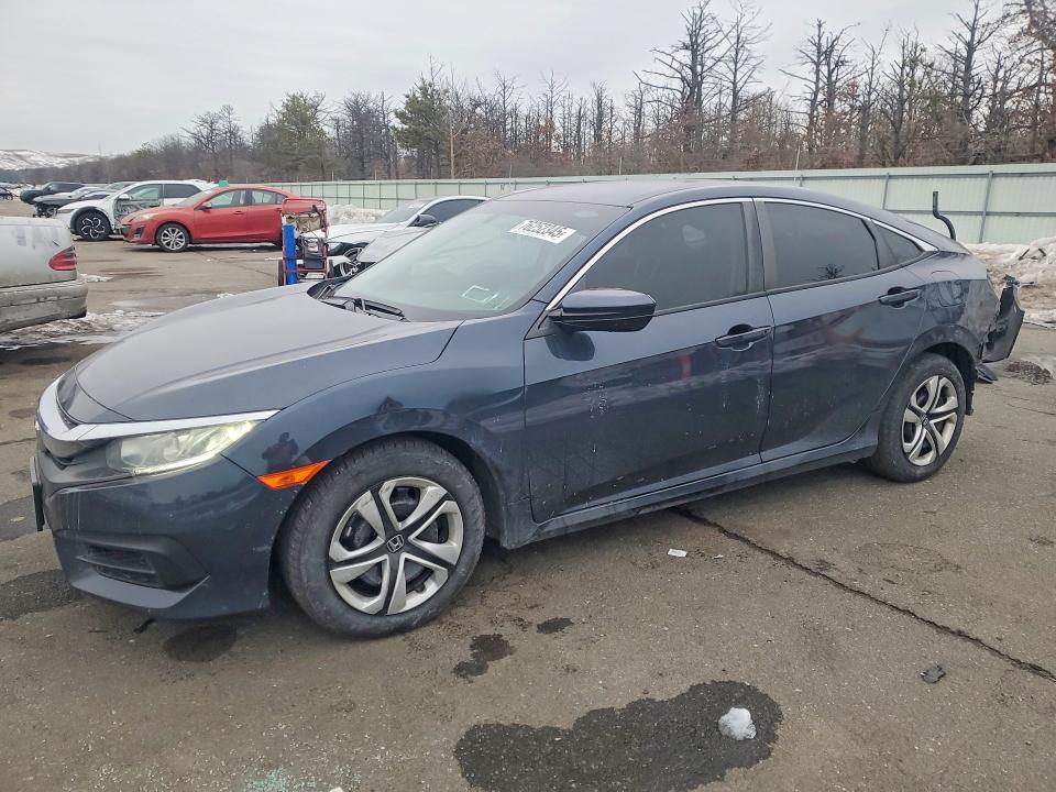 HONDA CIVIC 2018 with VIN 19XFC2F57JE208949 - Photo from auction