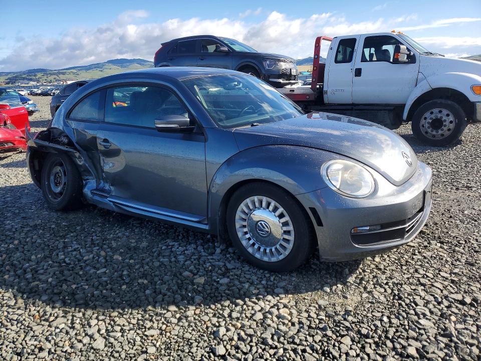 Photo 4 from auction – 2014 VOLKSWAGEN BEETLE with VIN 3VWH17AT7EM659941