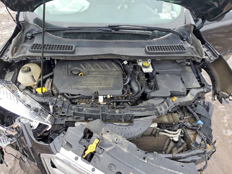 Photo 11 from auction – 2018 FORD ESCAPE with VIN 1FMCU9GD3JUA71083
