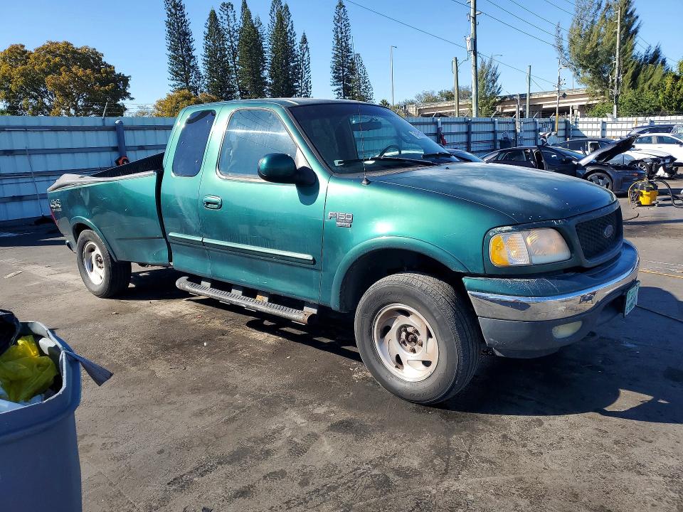 Photo 4 from auction – 2000 FORD F150 with VIN 1FTRX18LXYNC03208