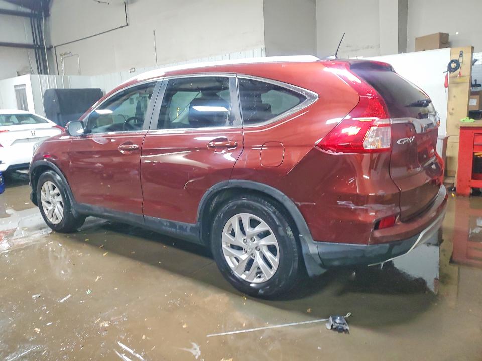 Photo 2 from auction – 2015 HONDA CR-V with VIN 2HKRM3H77FH501946