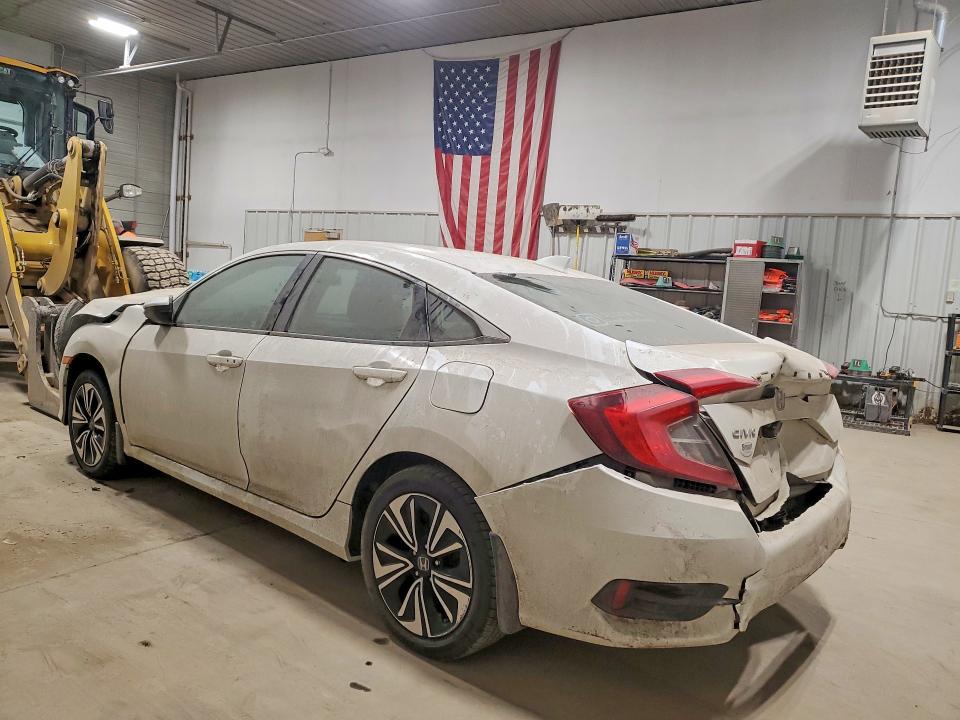 Photo 2 from auction – 2016 HONDA CIVIC with VIN 19XFC1F71GE036745