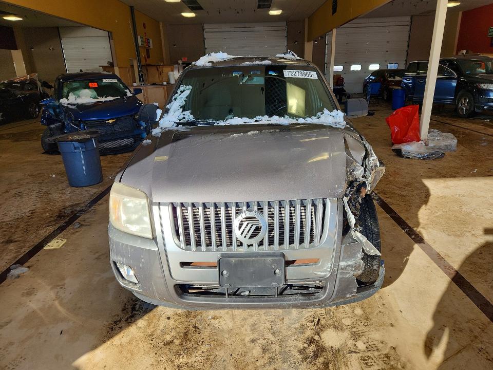 Photo 5 from auction – 2010 MERCURY MARINER with VIN 4M2CN8B70AKJ18945