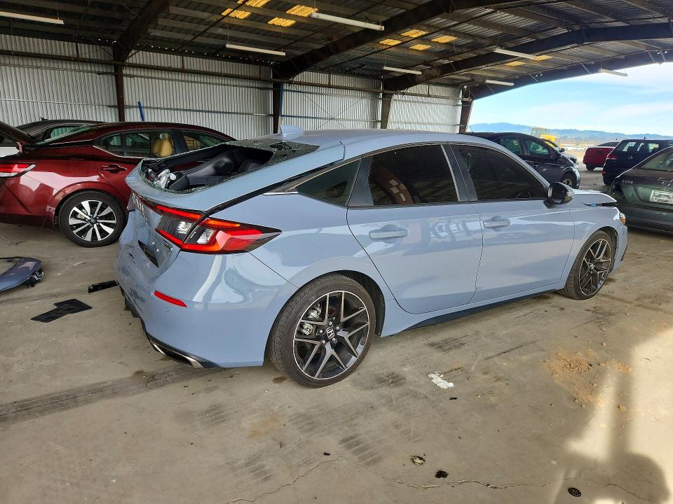 Photo 3 from auction – 2022 HONDA CIVIC with VIN 19XFL1H87NE019404