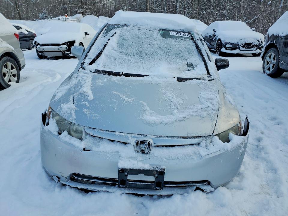 Photo 5 from auction – 2007 HONDA CIVIC DX with VIN 2HGFA16397H012461