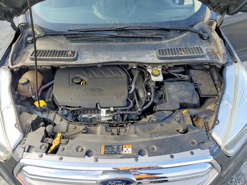 Photo 12 from auction – 2018 FORD ESCAPE with VIN 1FMCU9GD9JUA43868