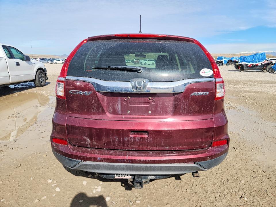 Photo 6 from auction – 2015 HONDA CR-V with VIN 2HKRM4H36FH689958
