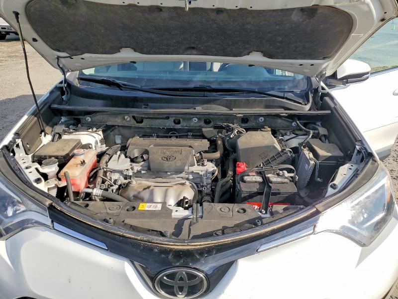 Photo 12 from auction – 2017 TOYOTA RAV4 with VIN JTMRFREV3HJ14512