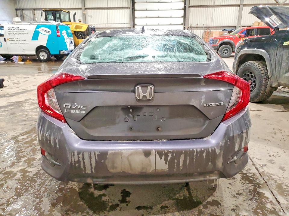 Photo 6 from auction – 2017 HONDA CIVIC with VIN 2HGFC1F94HH106022