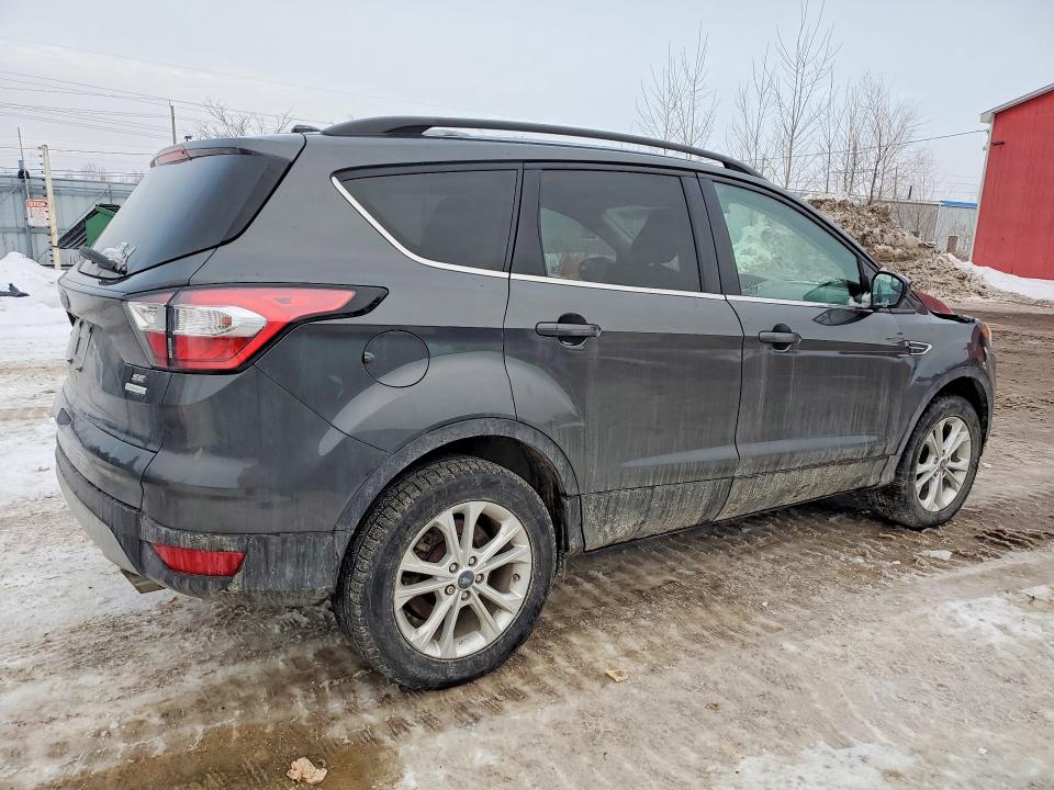 Photo 3 from auction – 2018 FORD ESCAPE with VIN 1FMCU0GD7JUD39483