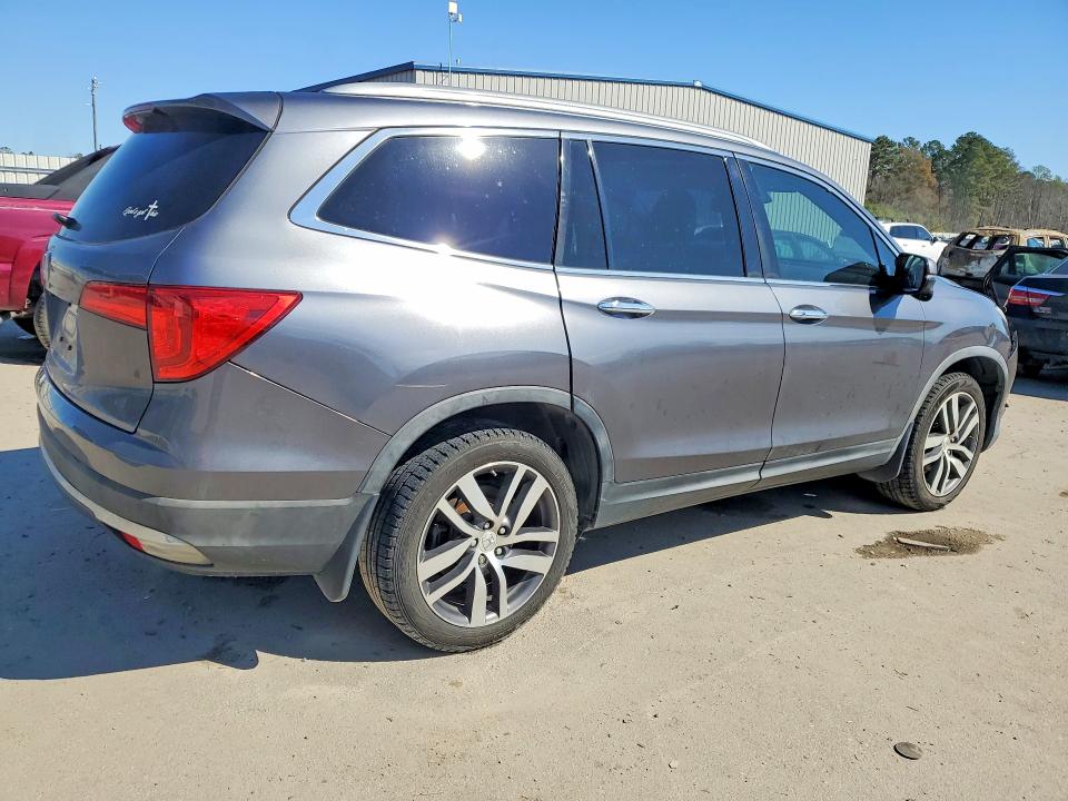 Photo 3 from auction – 2016 HONDA PILOT TOUR with VIN 5FNYF5H99GB053325