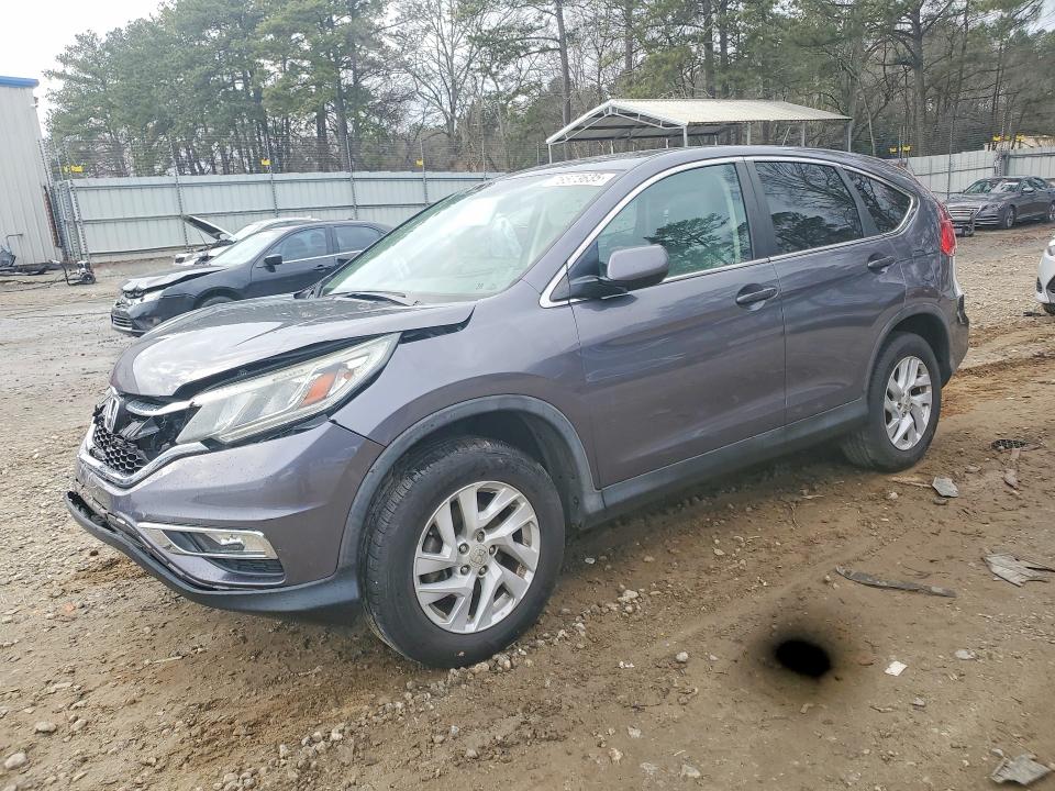 HONDA CR-V 2015 with VIN 3CZRM3H59FG702040 - Photo from auction