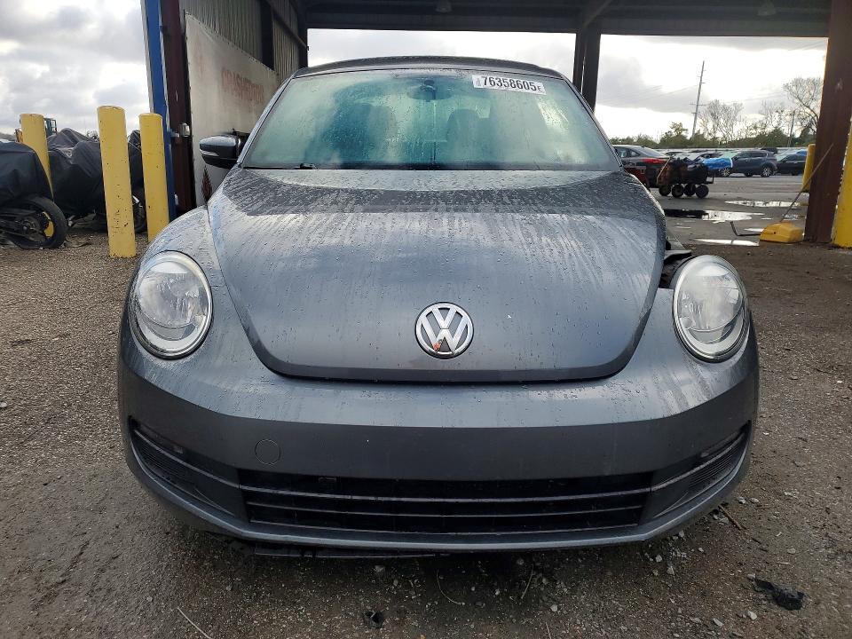 Photo 5 from auction – 2014 VOLKSWAGEN BEETLE with VIN 3VWJP7ATXEM611205