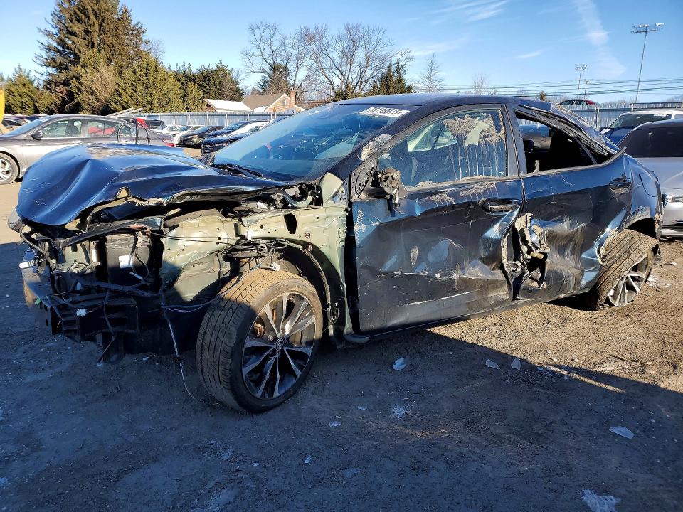 TOYOTA COROLLA 2017 with VIN 2T1BURHE2HC830465 - Photo from auction