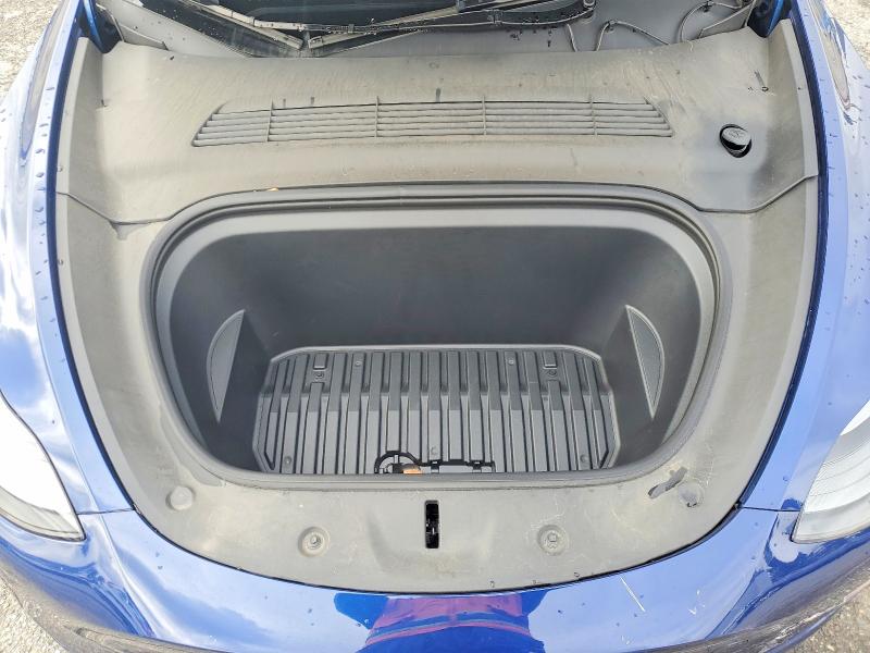 Photo 11 from auction – 2023 TESLA MODEL Y with VIN 7SAYGDED9PF946016