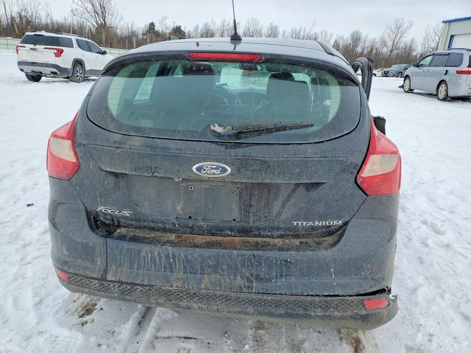 Photo 6 from auction – 2013 FORD FOCUS TITA with VIN 1FADP3N25DL120766