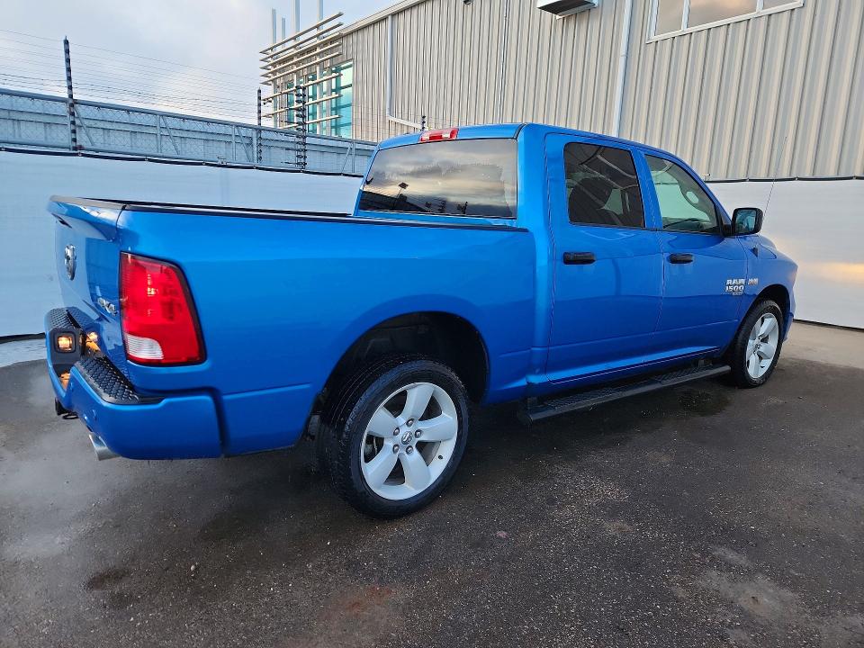 Photo 3 from auction – 2023 RAM 1500 CLASS with VIN 1C6RR7KT0PS582880