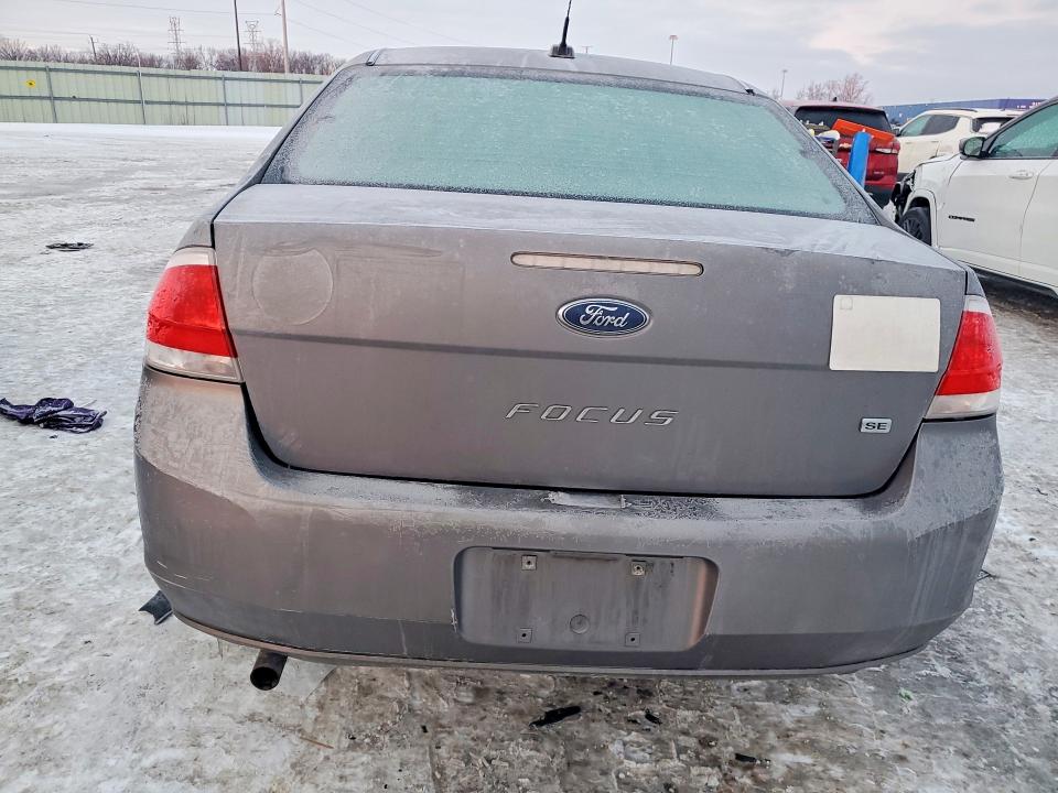 Photo 6 from auction – 2011 FORD FOCUS with VIN 1FAHP3FNXBW132174
