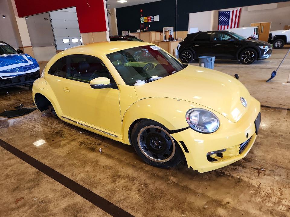 Photo 4 from auction – 2012 VOLKSWAGEN BEETLE with VIN 3VWJP7AT5CM606443