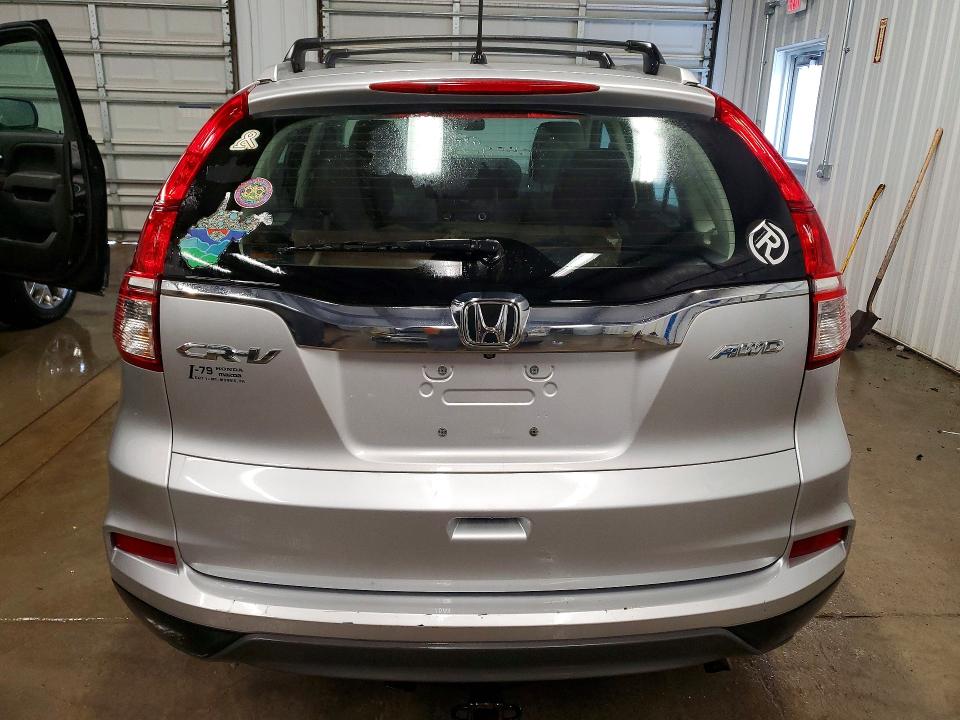 Photo 6 from auction – 2016 HONDA CR-V LX with VIN 2HKRM4H32GH634585