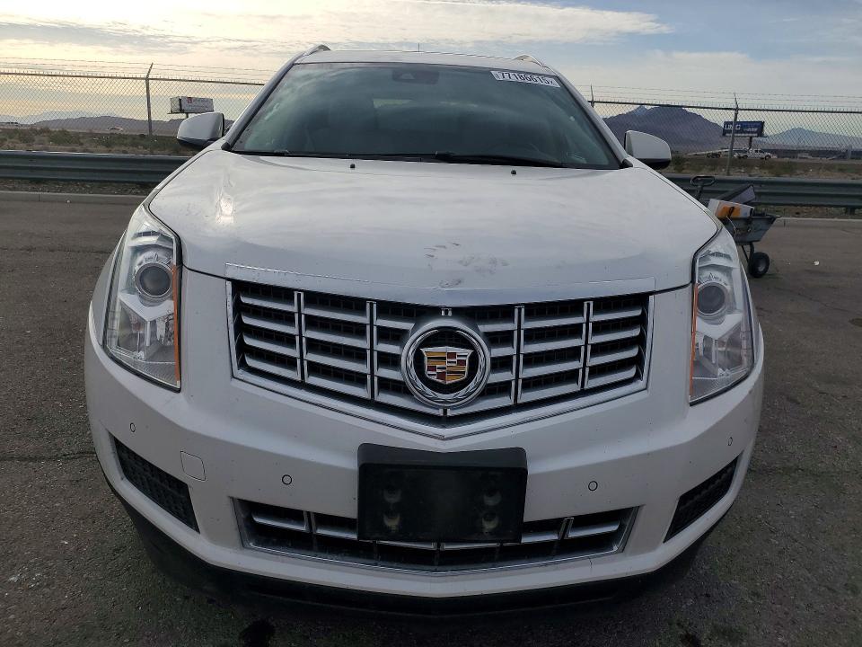 Photo 5 from auction – 2015 CADILLAC SRX LUXURY with VIN 3GYFNBE37FS633276
