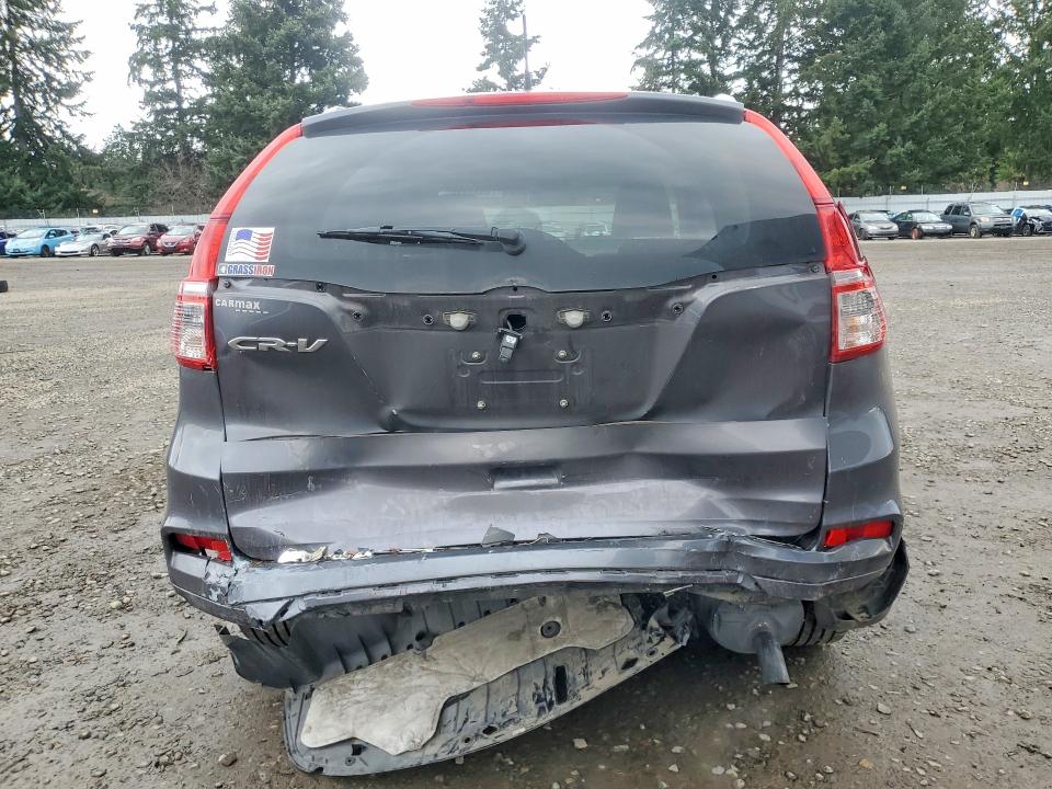 Photo 6 from auction – 2016 HONDA CR-V with VIN 2HKRM3H79GH535128
