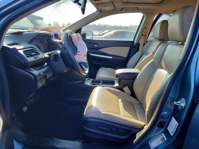 Photo 7 from auction – 2015 HONDA CR-V with VIN 2HKRM3H71FH517155
