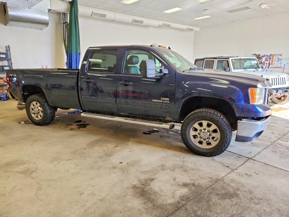 Photo 4 from auction – 2011 GMC SIERRA with VIN 1GT424C89BF128466