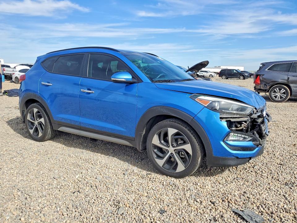 Photo 4 from auction – 2017 HYUNDAI TUCSON LIM with VIN KM8J33A20HU595395