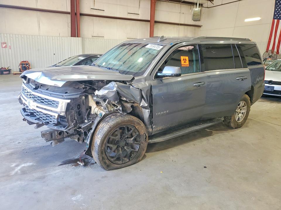 CHEVROLET TAHOE 2019 with VIN 1GNSCAKC0KR305226 - Photo from auction