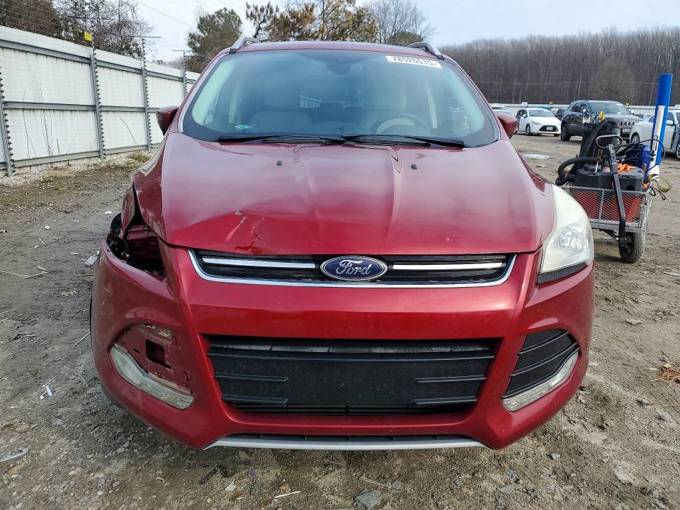 Photo 5 from auction – 2016 FORD ESCAPE with VIN 1FMCU0J99GUC52570