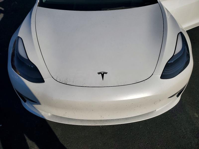 Photo 11 from auction – 2022 TESLA MODEL 3 with VIN 5YJ3E1EA8NF154972